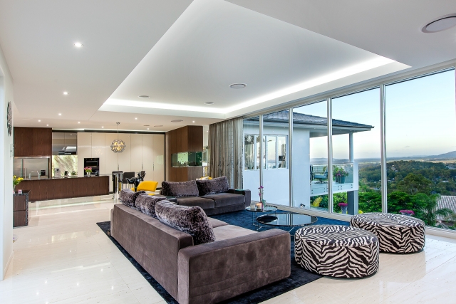 beautiful view, living room, luxury kitchen, custom made fish tank, fireplace, minka joinrey