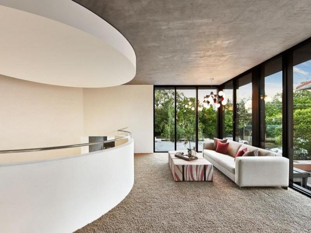 modern living room, curved wall, black metal windows, white interior, plush carpet, kew, Melbourne, minka joinery