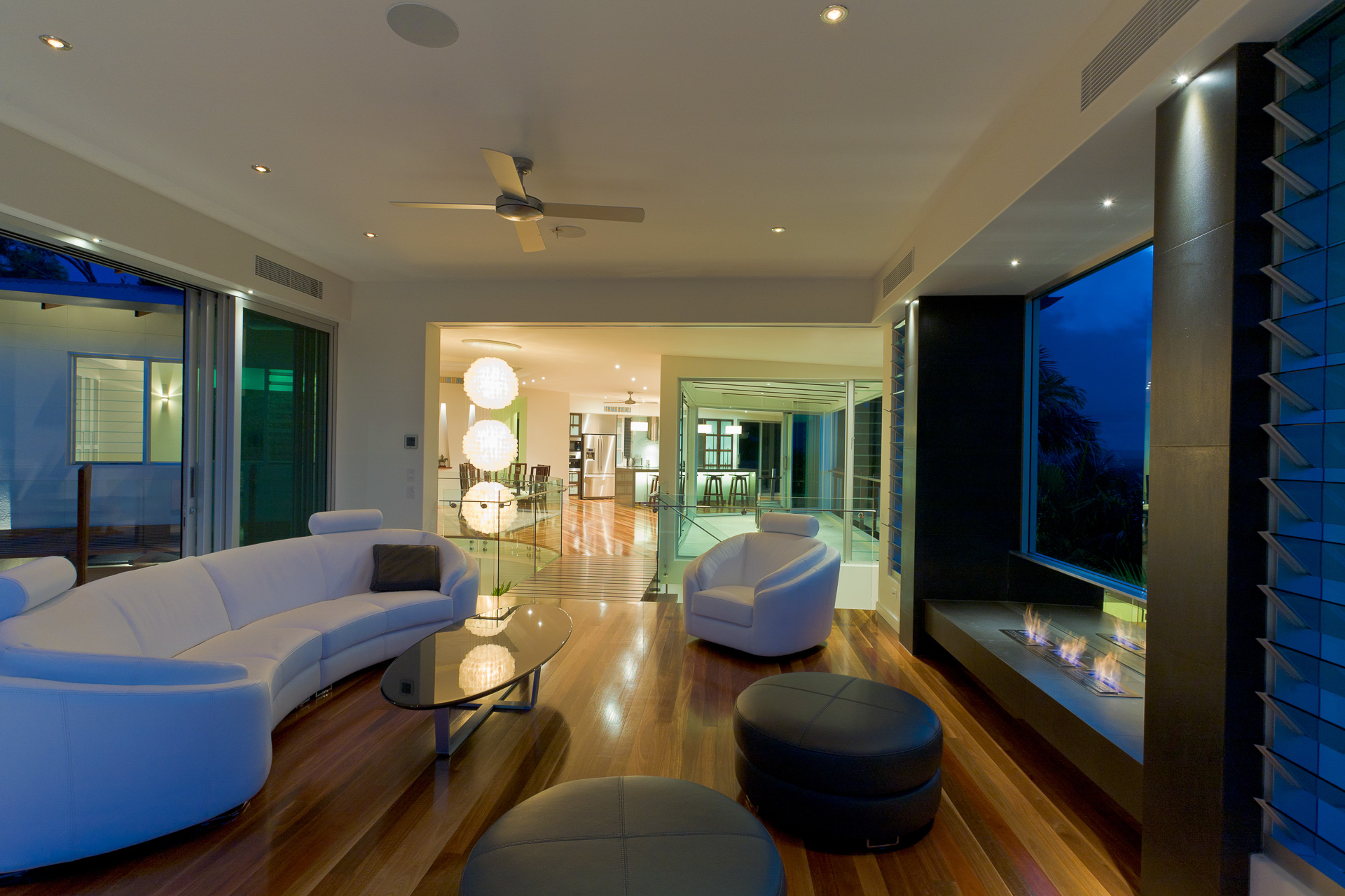 living room, fireplace, open plan, japanese kitchen, Resort Style Modern House, luxury interior, caesarstone, minka joinery